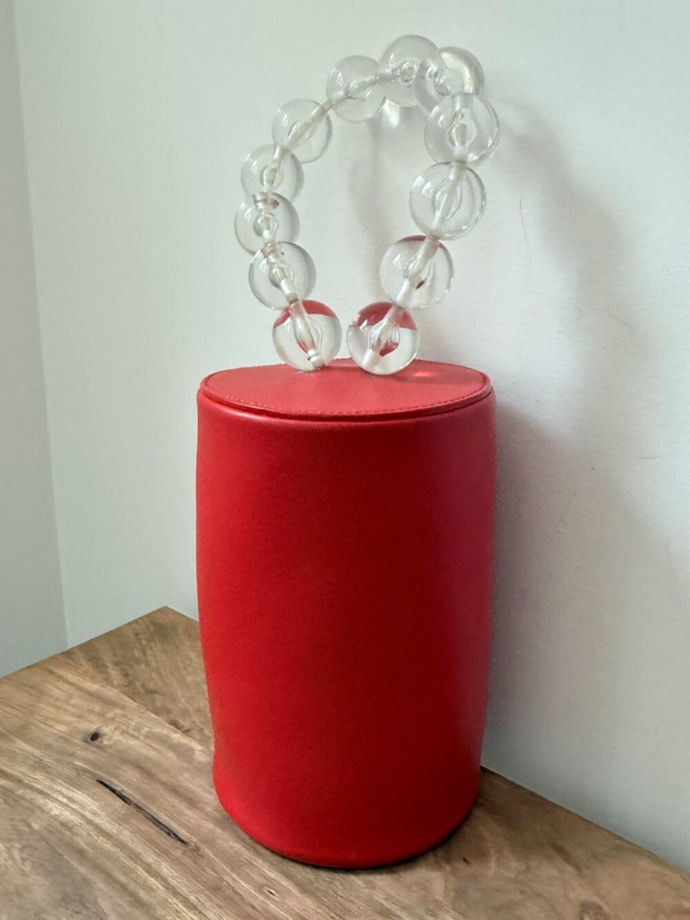 BUILDING BLOCK Red Smooth Leather Cylinder Bag Clear Acrylic Bead Wristlet